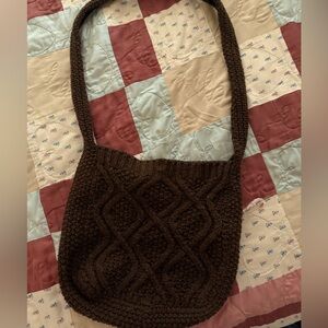 Brown crocheted bag with metal clasp